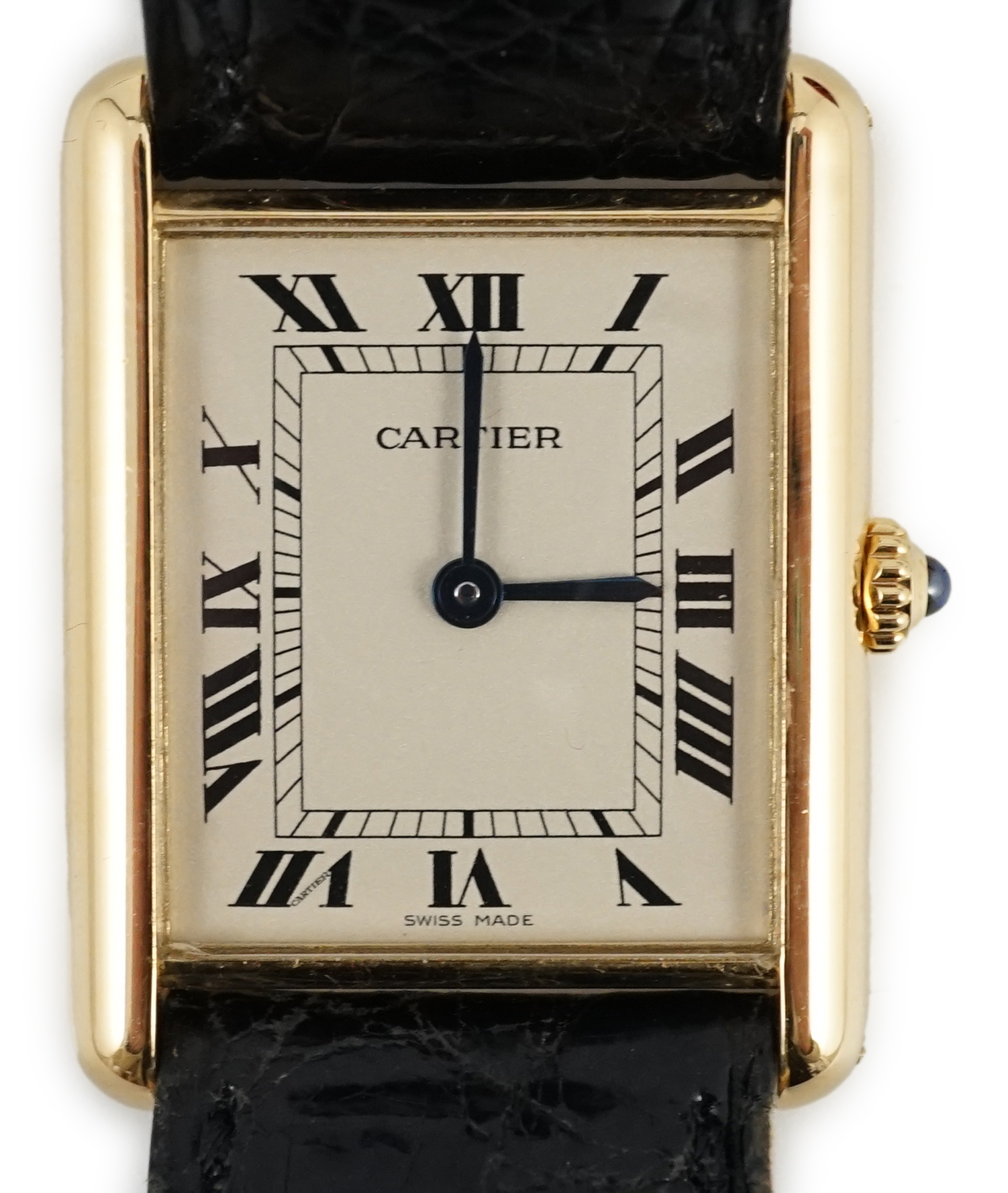 A gentleman's 18ct gold Cartier Tank quartz wrist watch, on a Cartier leather strap with Cartier 18ct gold buckle